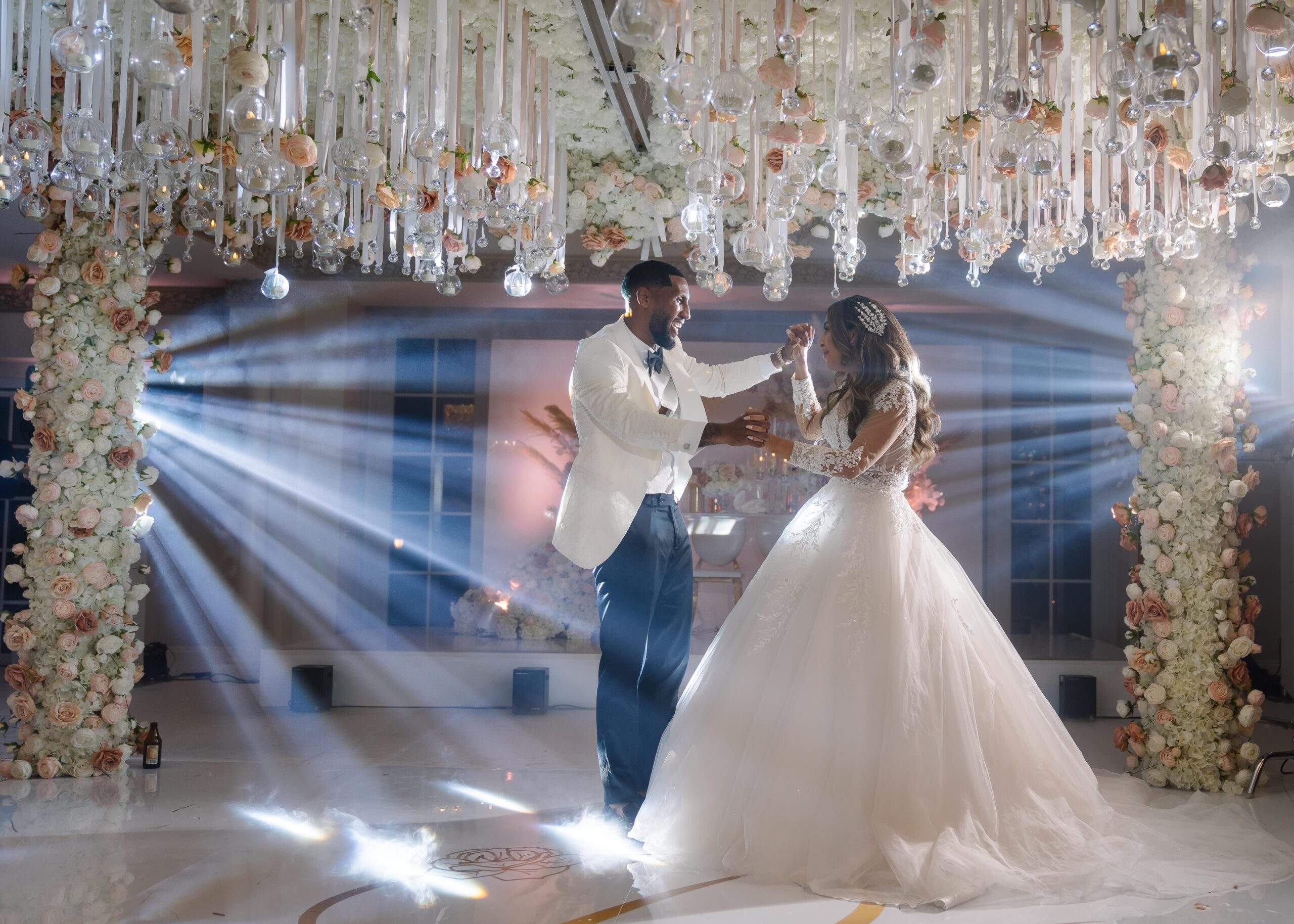 An African-Caribbean bride & groom enjoying their first dance on dry ice in Froyle Park's 300 capacity Grand Ballroom.