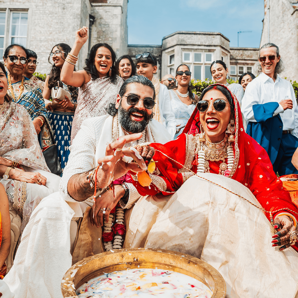 A joyful Froyle Park moment from a traditional South Indian Hindu wedding game known as 'Aeki-Beki'