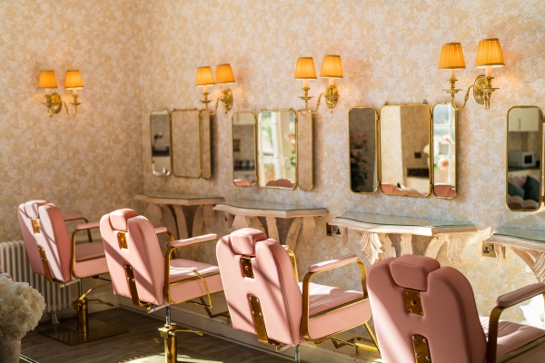 Alongside 32 bedrooms, Froyle Park has a designated getting ready space called the hideaway, featuring makeup stations and plush pink sofas