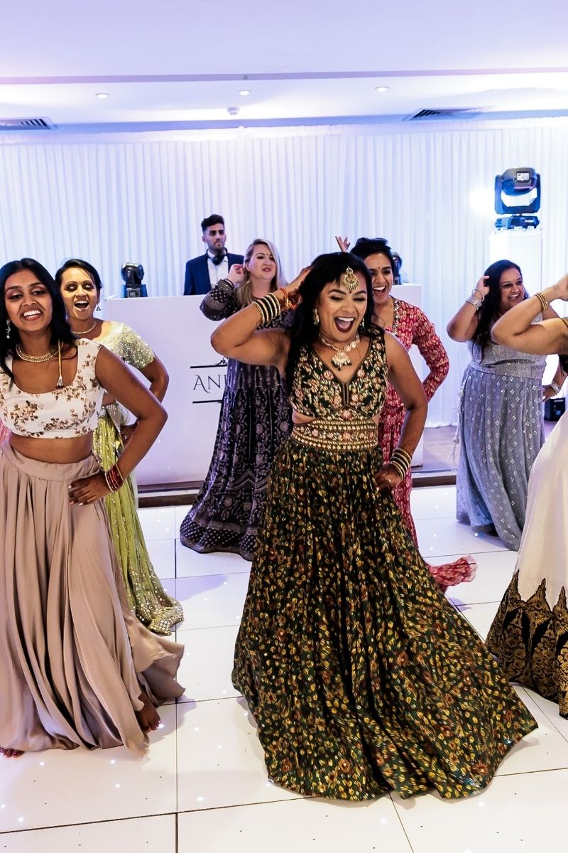 A lively dancefloor at an Asian wedding at Froyle Park